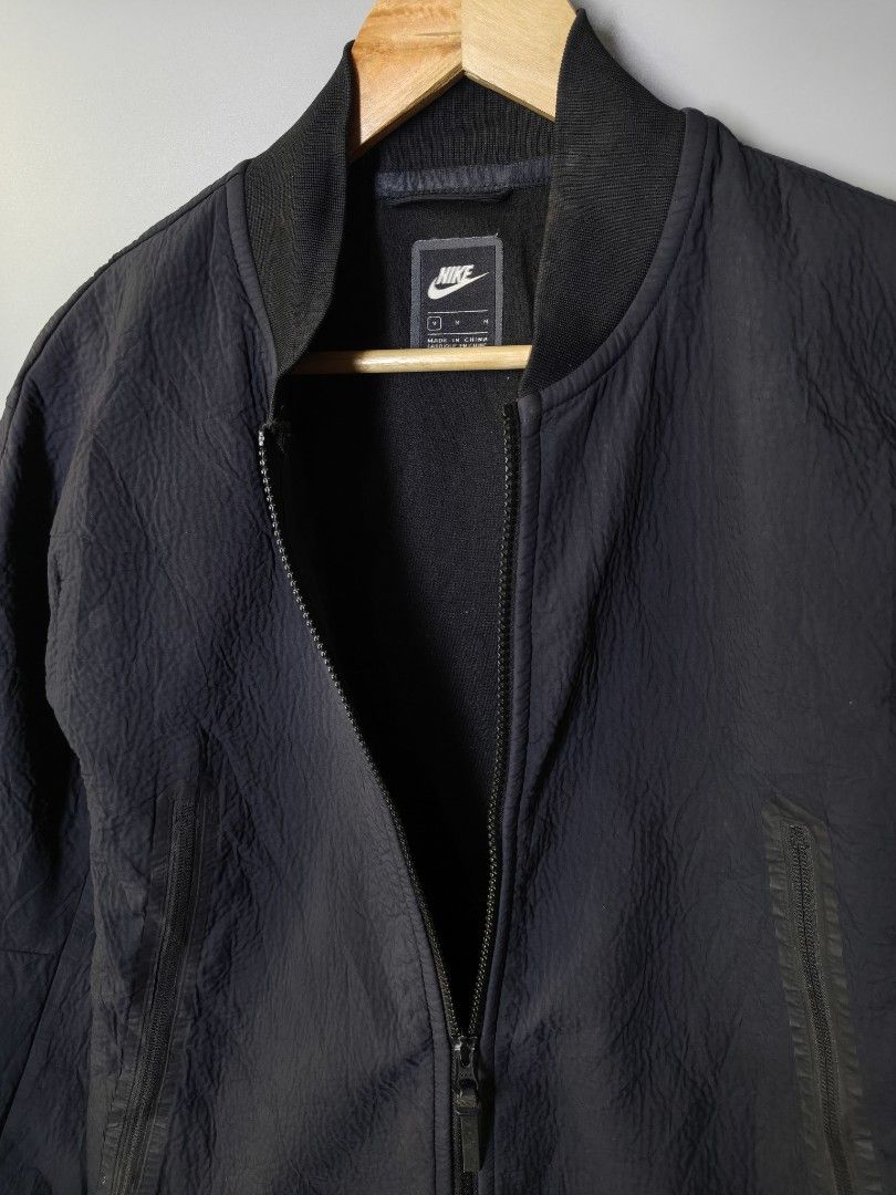 Nike Tech Pack Bomber (Category: Coats, Jackets and Outerwear) located in Baguio. Submitted by modern6tone6 (Listing ID 1470029436, Image 3). Description: Excellent Condition 9.5/10 color rate Medium on tag 21 Width 27 Length.