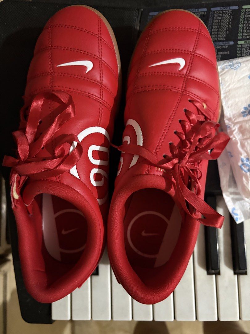 Nike Total 90 Indoor Shoes (Category: Sneakers) located in Quezon City. Submitted by ellemss (Listing ID 1470023335, Image 1). Description: - Brand/Model: Red Nike Indoor Football Shoes - Design: Classic Total 90 circular logo in white on the sides and insoles, complete with satin-like red laces - Soles: Gum rubber soles with very little wear and clean, intact grip patterns - Performance: Provides great traction, ideal for indoor courts and futsa