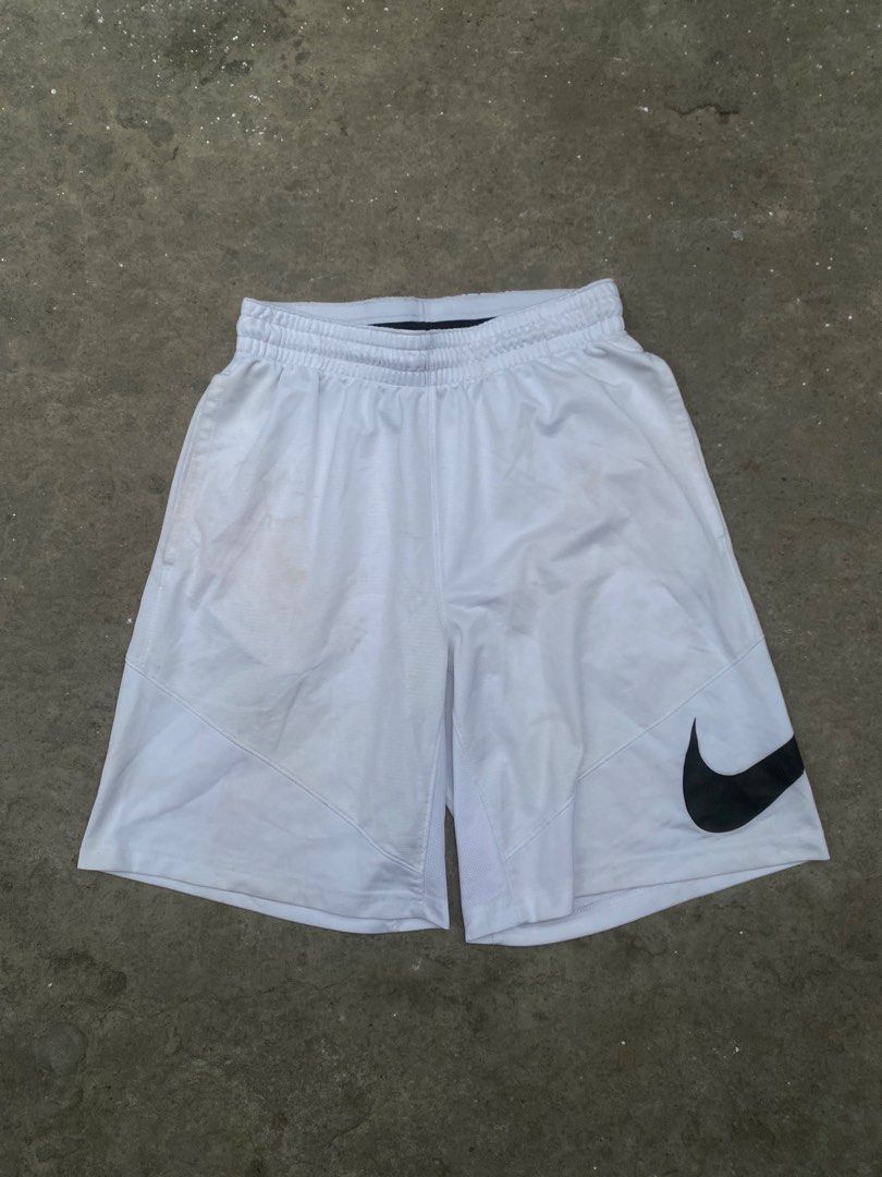 Nike White Basketball Shorts (Category: Shorts) located in Manila. Submitted by chongammak95823 (Listing ID 1470065369, Image 2). Description: Waist - 26 to 34 Length - 20 Leg open - 13 Issue: None Excellent condition Location: Tanza, Cavite MOP: GCASH Jnt courier (Can ship nationwide).