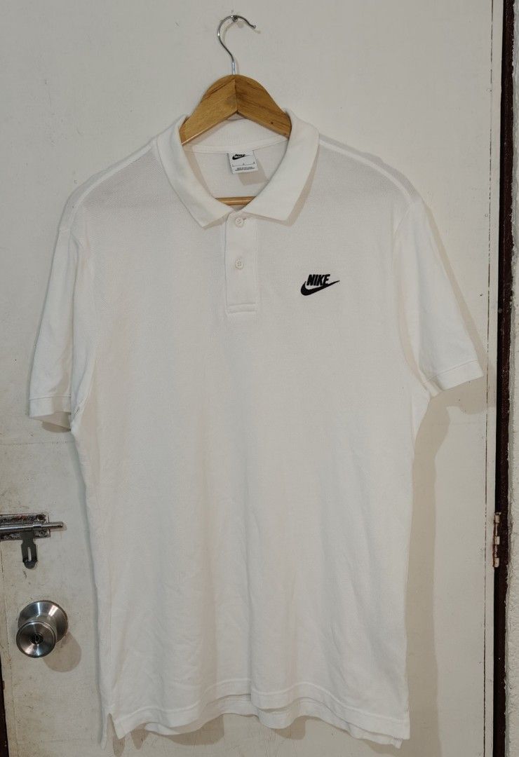Nike White Polo Shirt Size L (Category: Tshirts & Polo Shirts ) located in Bulacan. Submitted by adrian2325 (Listing ID 1470111325, Image 1). Description: - Brand: Nike - Style: Classic polo shirt - Color: White - Size: L - Origin: Made in Vietnam - Material: Textured pique fabric - Details: Black embroidered Nike logo on left chest, standard two-button placket and collar - Condition: Clean, excellent, ready to wear - Best for: Casual outings or 