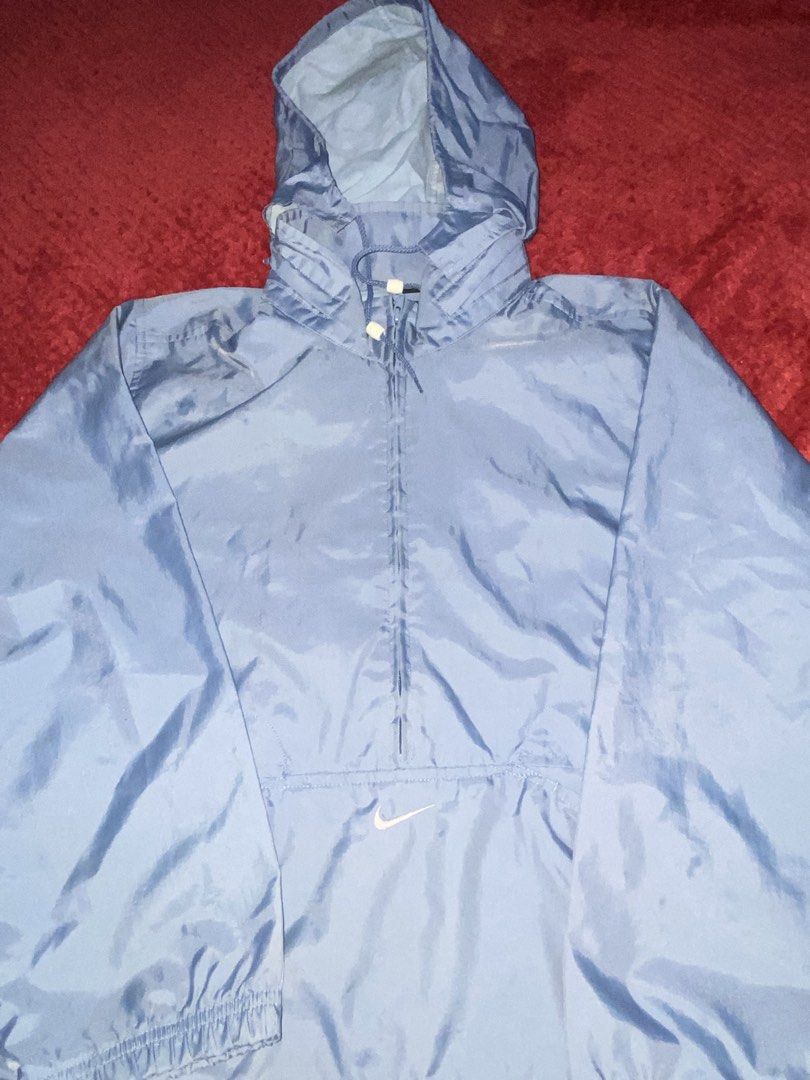 Nike Windbreaker Light Blue Size S (Category: Coats, Jackets and Outerwear) located in Manila. Submitted by almazankyle19 (Listing ID 1469803839, Image 2). Description: - Brand: Nike - Item: Light blue windbreaker jacket - Size: Small - Measurements: Width 21.5", Length 21" - 23" - Design: Quarter-zip front, high collar, elastic cuffs and hem - Branding: Small embroidered white Nike swoosh on the chest and back collar - Style: Clean look, perfect