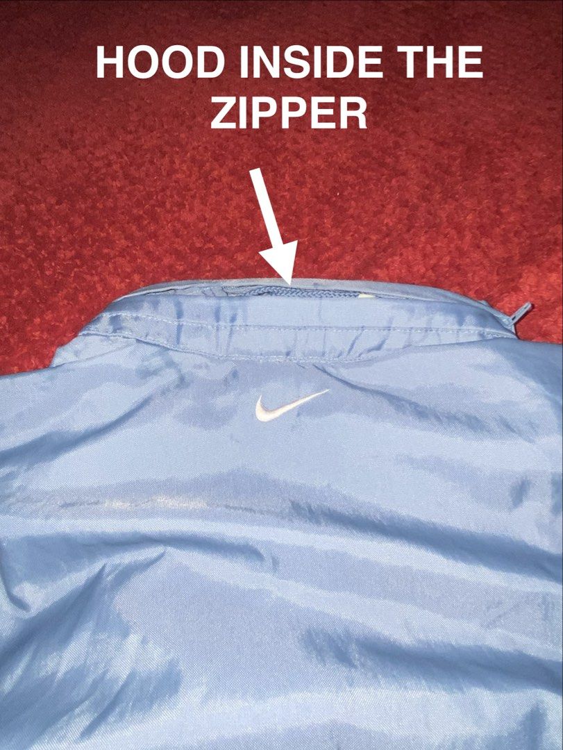 Nike Windbreaker Light Blue Size S (Category: Coats, Jackets and Outerwear) located in Manila. Submitted by almazankyle19 (Listing ID 1469803839, Image 3). Description: - Brand: Nike - Item: Light blue windbreaker jacket - Size: Small - Measurements: Width 21.5", Length 21" - 23" - Design: Quarter-zip front, high collar, elastic cuffs and hem - Branding: Small embroidered white Nike swoosh on the chest and back collar - Style: Clean look, perfect