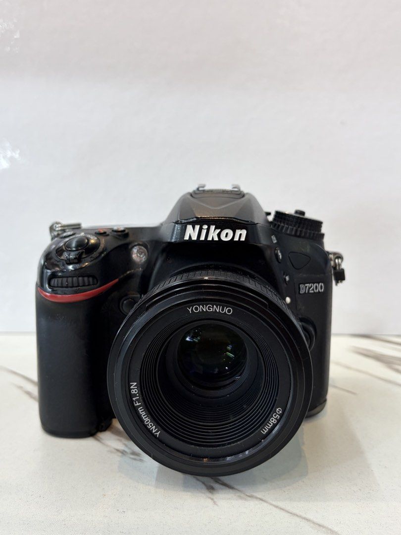 Nikon d7200 with 50mm lens (Category: Cameras) located in Manila. Submitted by gadgetcentral (Listing ID 1469989274, Image 1). Description: NIKON D7200 with 50mm 1.8 LENS P18,000 ➖ Sensor: 24.2MP APS-C DX-format CMOS ➖ Video: Full HD 1080p up to 60 fps ➖ Connectivity: Built-in Wi-Fi and NFC ➖ Storage: Dual SD card slots ✅ keypad working ✅ Auto focus working ✅ Clean glass ✅ No Vignettes ❌ card slot 1 not working ➡️NIKON D7200 BODY ➡️YONGNUO 50MM 1