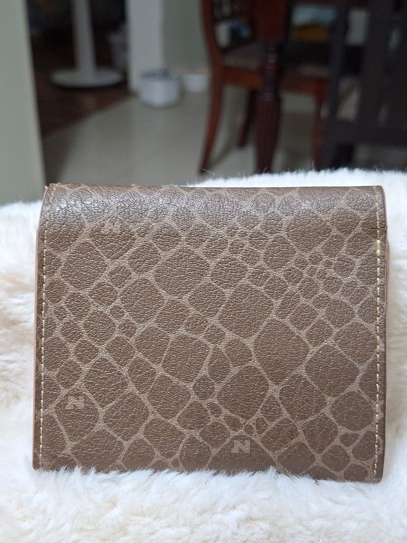 NINA RICCI LEATHER BIFOLD WALLET (Category: Wallets & Card holders) located in Las Pinas. Submitted by annachiaonair2037 (Listing ID 1470125353, Image 2). Description: NINA RICCI LEATHER BIFOLD WALLET FROM JAPAN GENUINE LEATHER NORMAL SIGN OF USAGE Disclaimer: I am not affiliated with, associated with, or authorized by any of the brands featured posted. Any mention of brand names, trademarks, or logos is solely for identification and reference pu