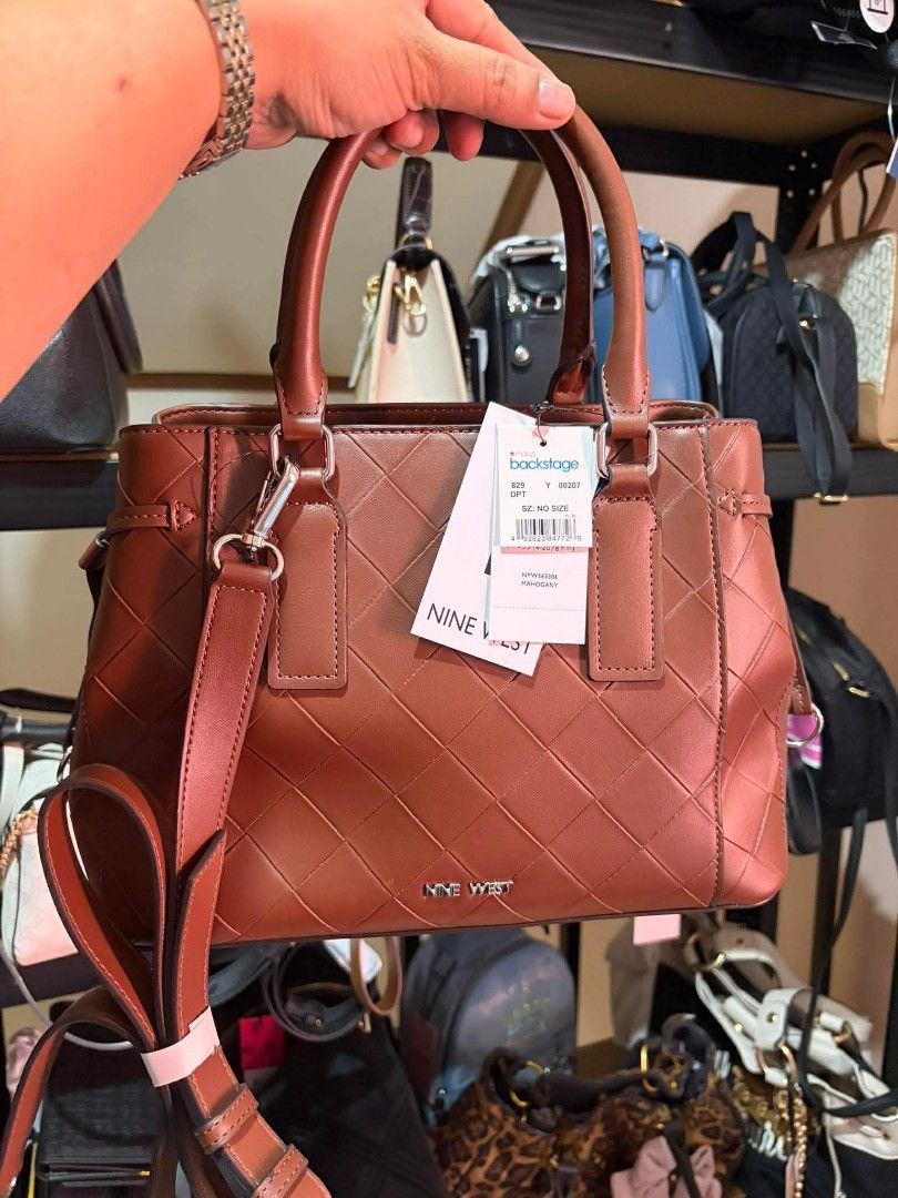 Nine West Mahogany Quilted Handbag with Strap (Category: Luxury Bags & Wallets) located in Manila. Submitted by belovedbyjess (Listing ID 1469978749, Image 1). Description: - Brand: Nine West (Original Macy's Backstage tag still attached) - Color & Material: Mahogany brown faux leather with quilted diamond pattern - Hardware: Silver-tone metal - Closure: Top zip closure - Straps: Two top handles plus a detachable, adjustable shoulder strap - Inte