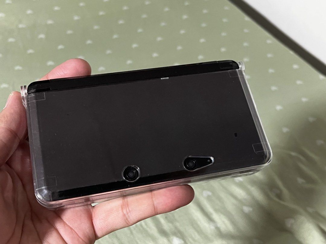 Nintendo 3DS - 32gb CFW Ready to Play (Category: Nintendo) located in Marikina City. Submitted by jaydxgamer (Listing ID 1470092505, Image 2). Description: ✅ Modded/CFW – preloaded with tons of games ✅ 32GB memory card (puno ng games ) ✅ Maganda pa, no issues sa gameplay ✅ Okay battery life, charges properly ✅ All working w/ some signs of usage like touch marks sa touch dcreen Inclusions: Nintendo 3DS 32GB memory (loaded with games) Charger Stylu