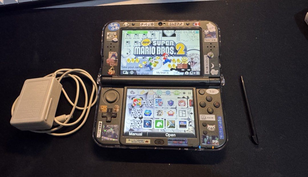 Nintendo New 3DS XL (IPS Top Screen) – Fully Working (Category: Nintendo) located in Manila. Submitted by charliefort (Listing ID 1469978015, Image 1). Description: Includes: - Nintendo New 3DS XL Console - IPS Top Screen - 16GB microSD Card (installed) - Original Charger - Protective Shell Case - Carrying Case / Pouch - Aftermarket Stylus (included, does not fit in the console's stylus slot) Condition: - Fully functional - Touchscreen working - 