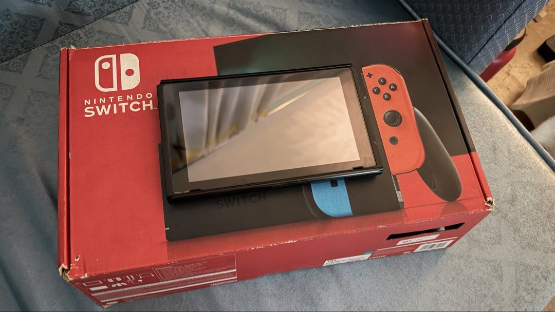 Nintendo Switch Console with Dobe Controller and Case (Category: Nintendo) located in Paranaque City. Submitted by chasanmig (Listing ID 1470054544, Image 1). Description: Fs> Nintendo Switch 1 V2 - Non JB NO JOYCONS Inclusions: - Tablet - Original HDMI - Original Dock - Original Joycon Grips & Straps - Box - Dobe Eggshell (used hard) - Dobe Bag ₱7k Parañaque area Lalamove Ready / Test upon pickup Open for VC.