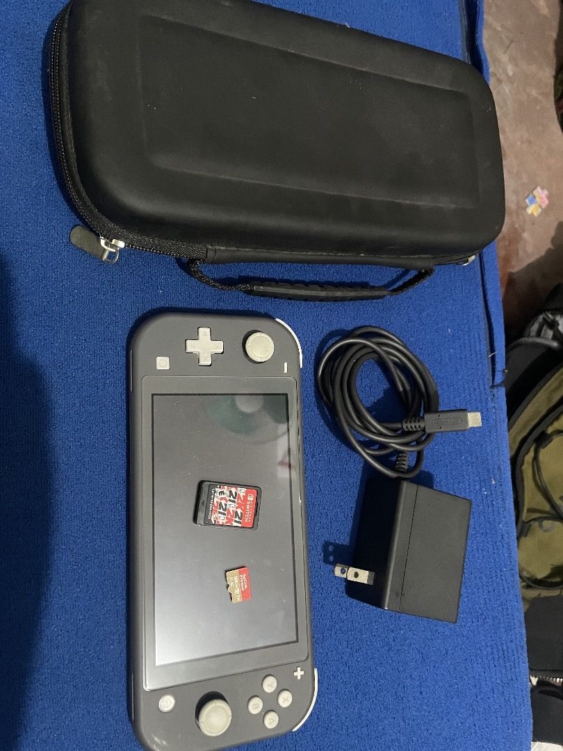 Nintendo Switch Lite 128gb (Category: Nintendo) located in Caloocan City. Submitted by itisreymart-60364 (Listing ID 1469984928, Image 2). Description: -sandisk micro sd 128gb -original charger -cheap bag -orig box 6500 nego meetups valenzuela qc pasig.