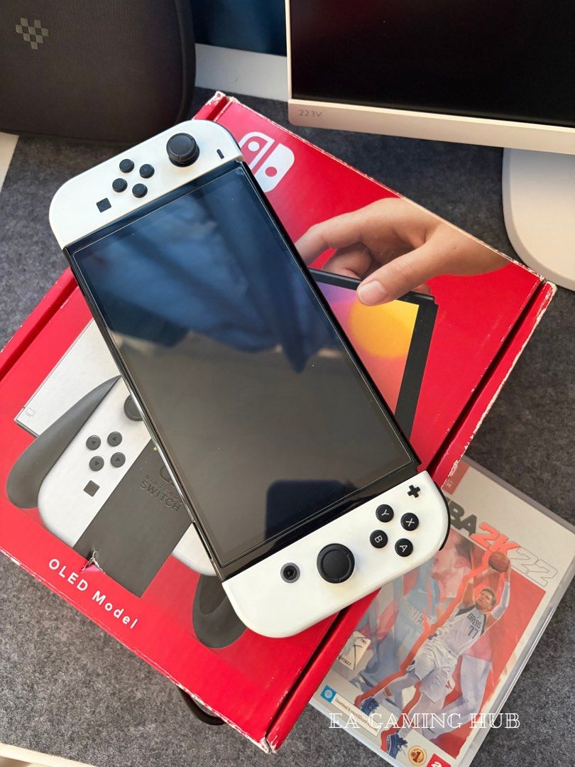 Nintendo Switch Oled with Physical Games (Category: Nintendo) located in Manila. Submitted by eagaminghub (Listing ID 1469979312, Image 1). Description: For Sale Nintendo Switch Oled with Physical Games For only 10.5k Feel free to visit our page EA Gaming Hub Inclusion: - Unit - NBA 2k22 (Physical Games) - Dock - HDMI (ugreen) - Strap - Charger - Box Location: Sta. Maria, Bulacan MOD: - meet up within Sta. Maria, Bulacan - pag sa ibang lugar sago
