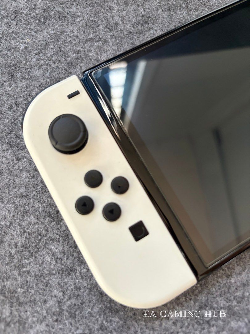 Nintendo Switch Oled with Physical Games (Category: Nintendo) located in Manila. Submitted by eagaminghub (Listing ID 1469979312, Image 2). Description: For Sale Nintendo Switch Oled with Physical Games For only 10.5k Feel free to visit our page EA Gaming Hub Inclusion: - Unit - NBA 2k22 (Physical Games) - Dock - HDMI (ugreen) - Strap - Charger - Box Location: Sta. Maria, Bulacan MOD: - meet up within Sta. Maria, Bulacan - pag sa ibang lugar sago