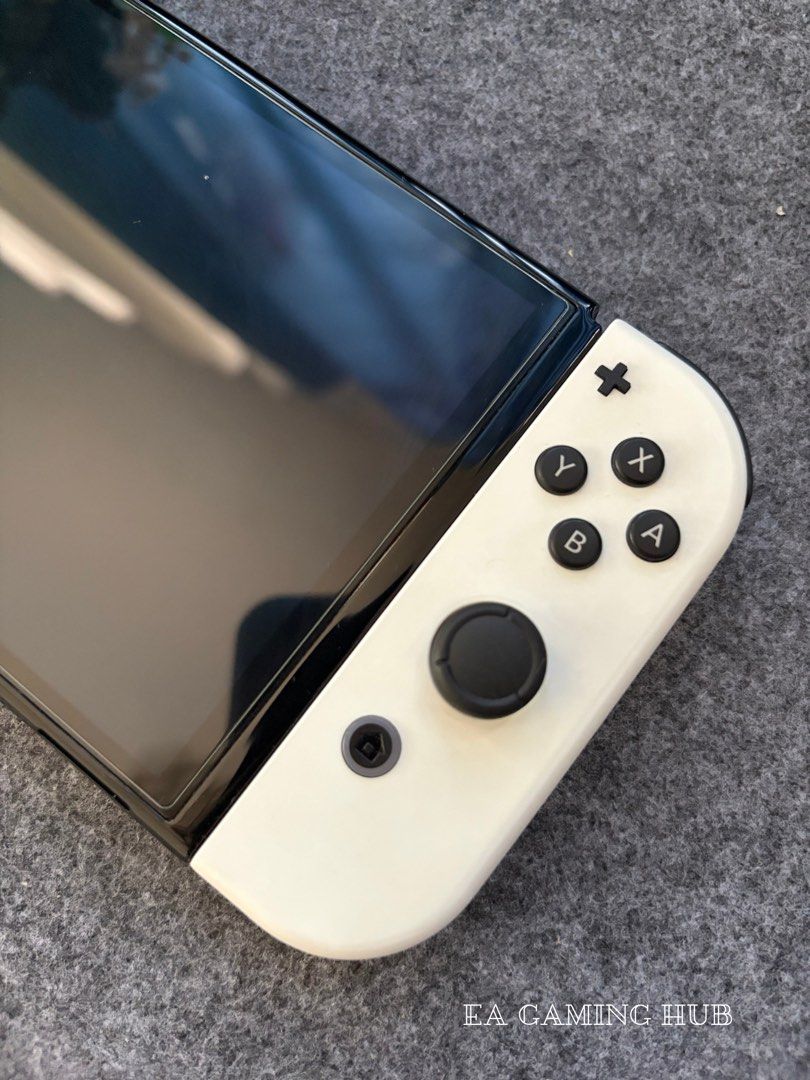 Nintendo Switch Oled with Physical Games (Category: Nintendo) located in Manila. Submitted by eagaminghub (Listing ID 1469979312, Image 3). Description: For Sale Nintendo Switch Oled with Physical Games For only 10.5k Feel free to visit our page EA Gaming Hub Inclusion: - Unit - NBA 2k22 (Physical Games) - Dock - HDMI (ugreen) - Strap - Charger - Box Location: Sta. Maria, Bulacan MOD: - meet up within Sta. Maria, Bulacan - pag sa ibang lugar sago