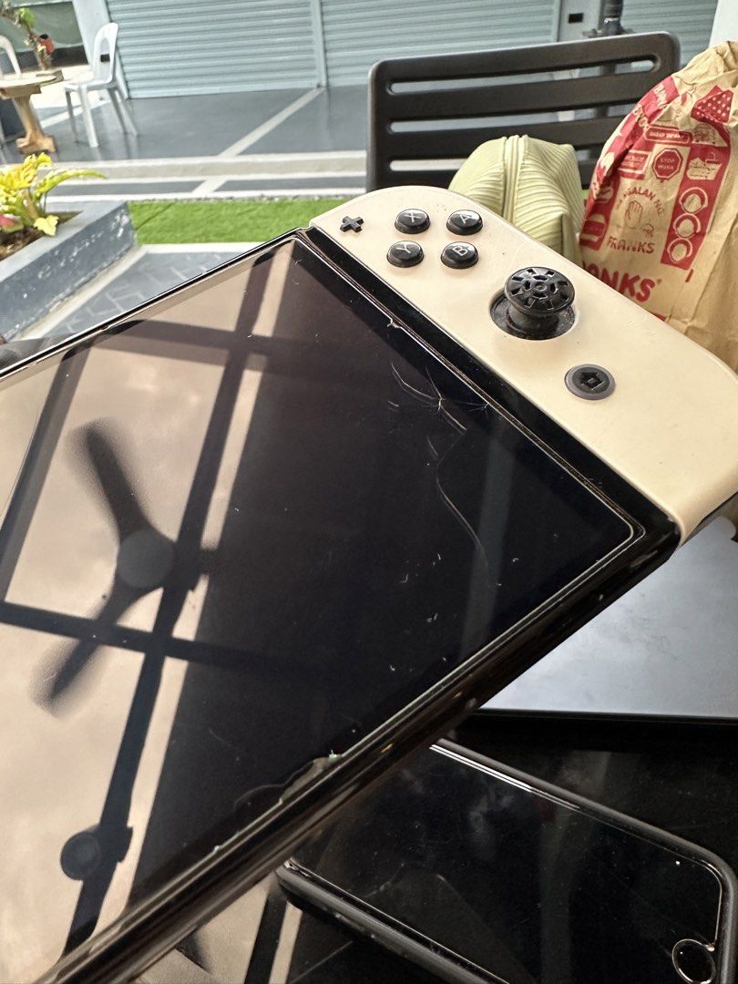 Nintendo Switch V1 Console Bundle + 3 Games + Accessories (Category: Nintendo) located in Roxas City. Submitted by tel_02 (Listing ID 1470045220, Image 2). Description: INCLUSIONS • Nintendo Switch console with white Joy-Cons • The Legend of Zelda: Breath of the Wild • The Legend of Zelda: Tears of the Kingdom • Pokémon Legends: Arceus • Joy-Con grip • 2 Joy-Con wrist straps • Charger/AC adapter • tomtoc carrying case CONDITION • Used, with signs