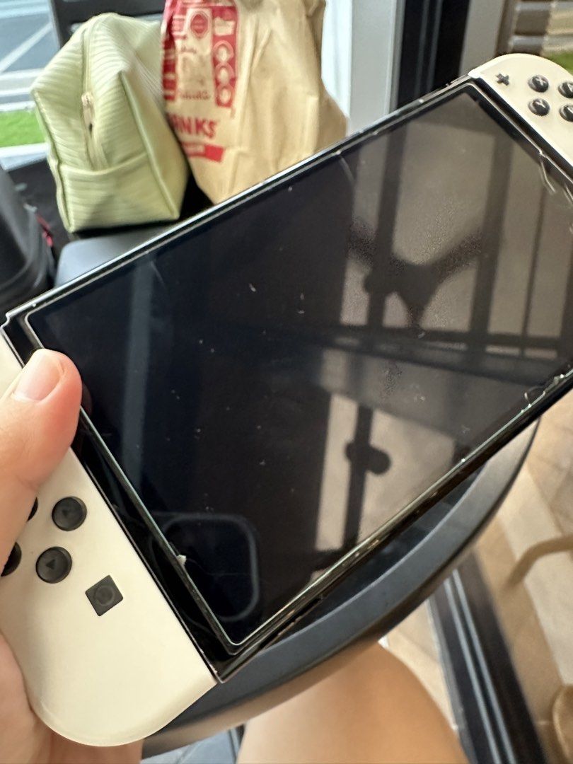 Nintendo Switch V1 Console Bundle + 3 Games + Accessories (Category: Nintendo) located in Roxas City. Submitted by tel_02 (Listing ID 1470045220, Image 3). Description: INCLUSIONS • Nintendo Switch console with white Joy-Cons • The Legend of Zelda: Breath of the Wild • The Legend of Zelda: Tears of the Kingdom • Pokémon Legends: Arceus • Joy-Con grip • 2 Joy-Con wrist straps • Charger/AC adapter • tomtoc carrying case CONDITION • Used, with signs