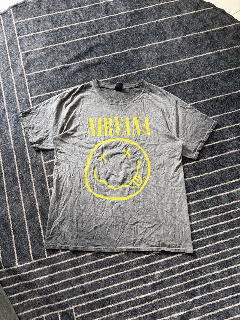 Nirvana shirt gildan tag dated 2016 (Category: Activewear) located in Batangas. Submitted by robertlopezigaya (Listing ID 1469981381, Image 1). Description: Nirvana gildan tag dated 2016 Size L Minor hairline only Excellent.