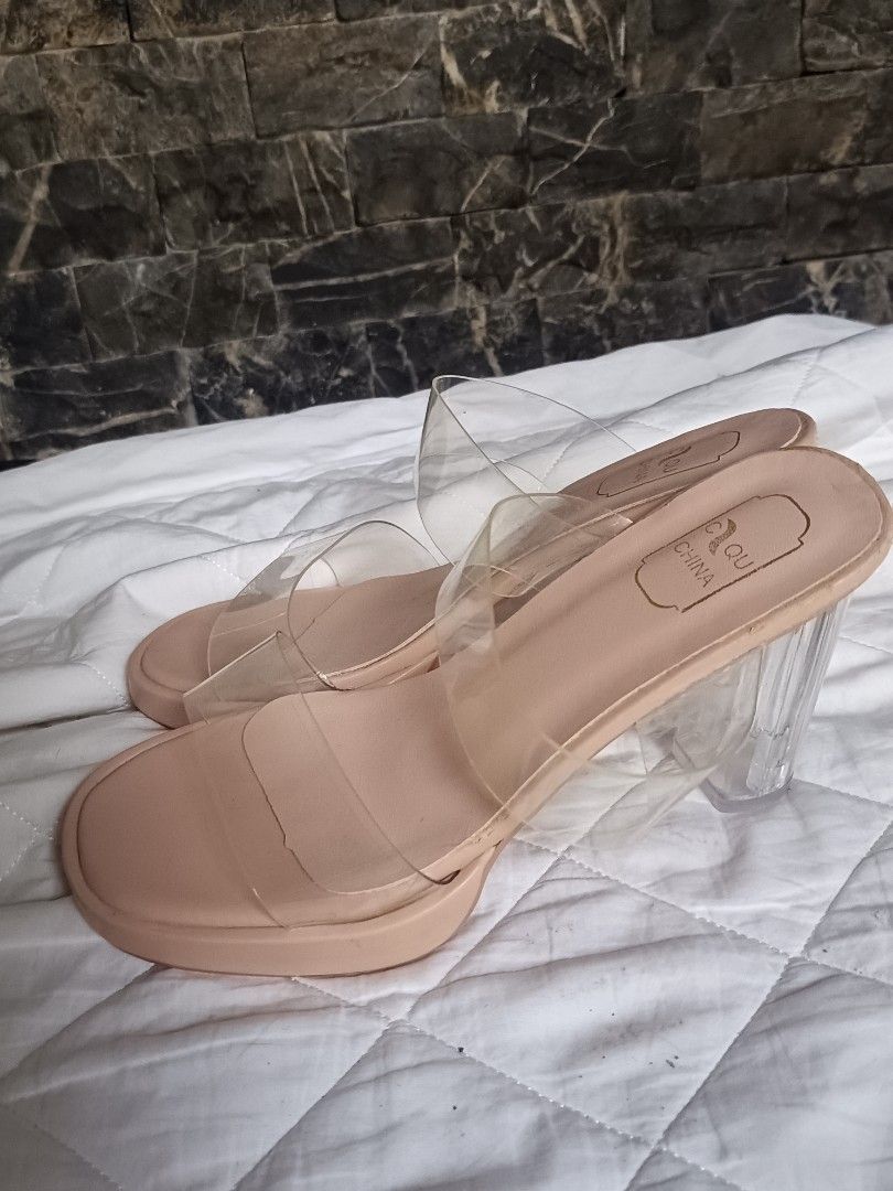 Nude Clear Strap Chunky Heels Size 36 (Category: Heels) located in Cebu City. Submitted by vionchan (Listing ID 1469978452, Image 3). Description: - Brand: Clou (Made in China) - Size: 36 (stamped on sole) - Style: Nude heels with clear PVC double straps and open square toe - Heel: Thick transparent block heel - Condition: Gentle wear on soles; minor peeling near the insole stamping area (check photos).