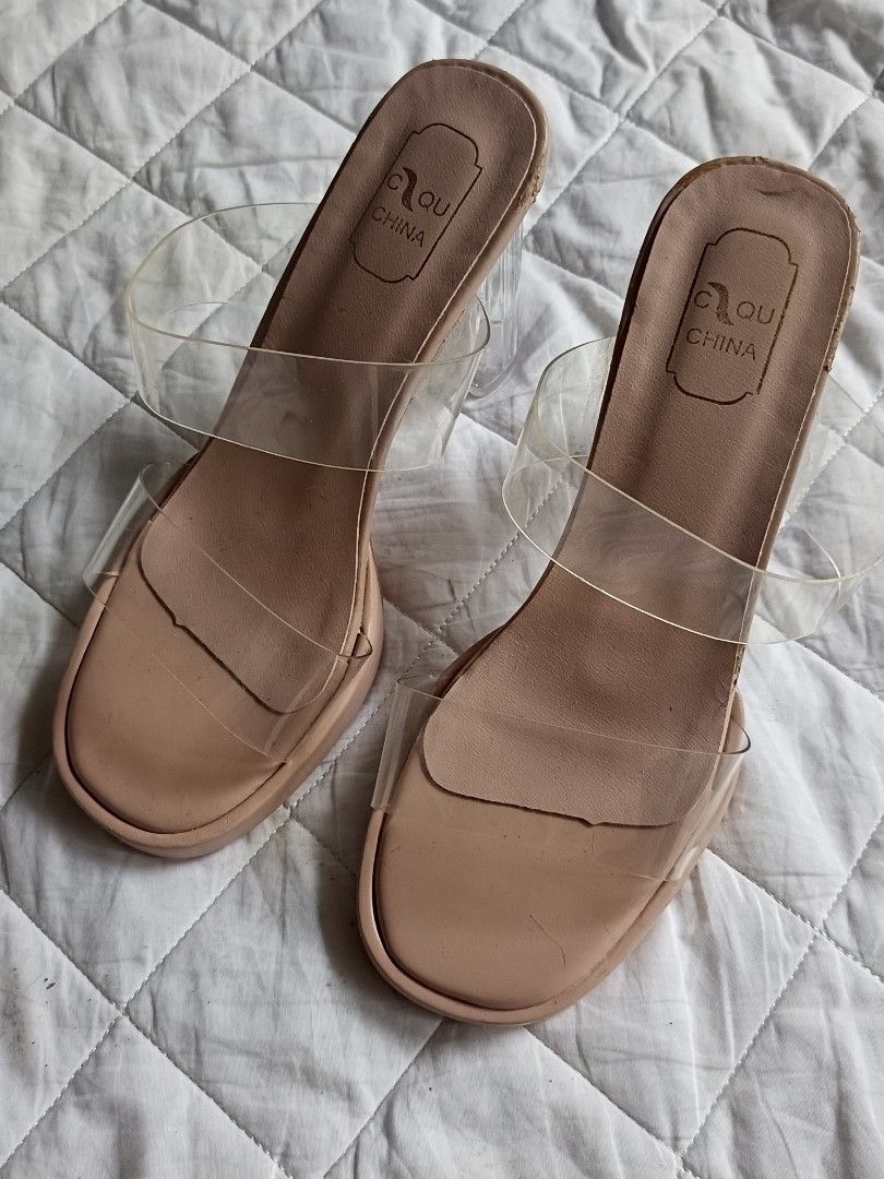Nude Clear Strap Chunky Heels Size 36 (Category: Heels) located in Cebu City. Submitted by vionchan (Listing ID 1469978452, Image 2). Description: - Brand: Clou (Made in China) - Size: 36 (stamped on sole) - Style: Nude heels with clear PVC double straps and open square toe - Heel: Thick transparent block heel - Condition: Gentle wear on soles; minor peeling near the insole stamping area (check photos).
