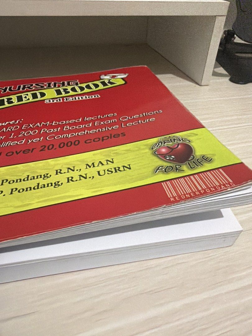 Nursing Red Book 3rd Edition by Pondang (Category: Textbooks) located in Caloocan City. Submitted by bibyanieee (Listing ID 1470123960, Image 2). Description: - Title: Nursing Red Book (3rd Edition) - Authors: Pondang, R.N., MAN & Pondang, R.N., USRN - Format: Softbound with red and yellow cover design - Content: Board exam-based lectures and over 1,200 past board exam questions - Proven Track Record: Over 20,000 copies printed - Best For: Nursin