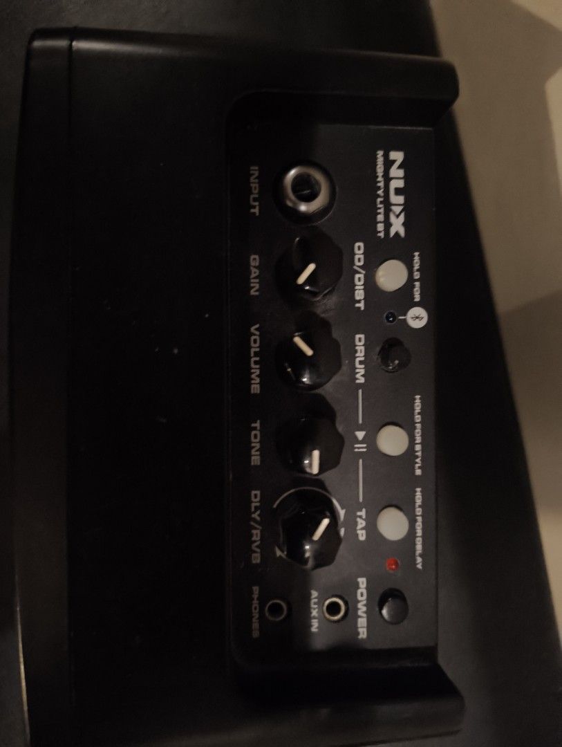 NUX Mighty Lite BT Guitar Amplifier (Category: Musical Instruments) located in Rizal. Submitted by norkizz92 (Listing ID 1470035332, Image 2). Description: - Compact desktop practice amp with a sleek black finish and red trim - Bluetooth capability for easy jamming along with your favorite tracks - Built-in drum machine with tap tempo feature - Comprehensive controls: gain, volume, tone, and delay/reverb - Versatile connectivity: input jack, auxi