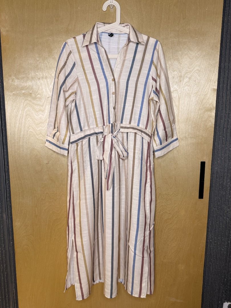 Office Dress (Category: Dresses) located in Pasig City. Submitted by the_thrift_fix (Listing ID 1470035673, Image 2). Description: Midi oatmeal dress, with multi-colored stripes. Best for casual errand runs or office days with the right pair of shoes. Best fits Medium to Semi Large Apologies but no time for other photos or "when worn" photos. Lightly used in good condition Measurements: Arm Diameter: 18 inches Bust Diameter 36 inches Dress Length