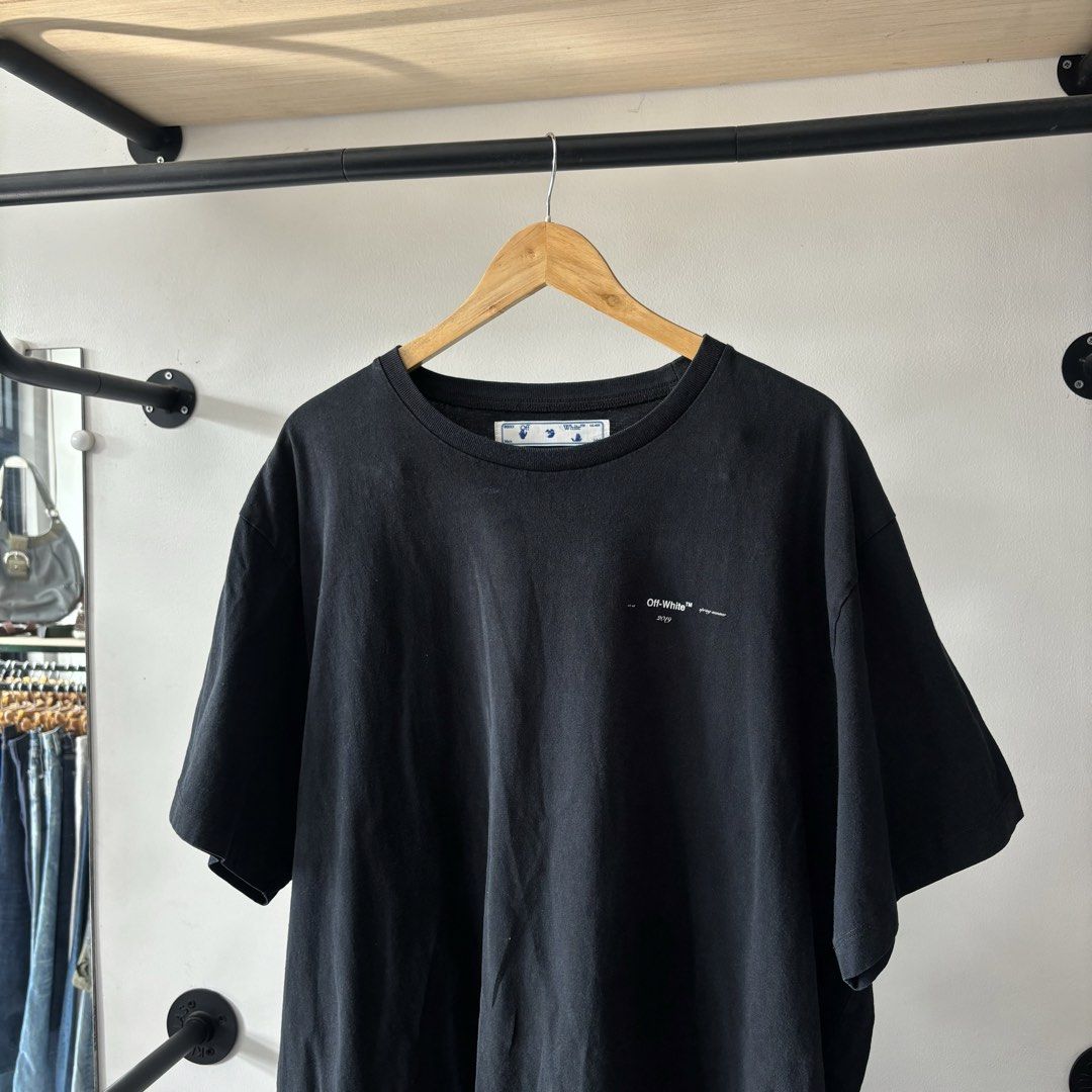 Off-White Black T-Shirt Size L (Category: Shirts) located in Bambang. Submitted by heats777 (Listing ID 1470020444, Image 1). Description: - Authentic Off-White black t-shirt - Size: Large (True to size) - Material: 100% comfortable cotton - Design: Minimalist front print branding with classic crew neck and short sleeves - Condition: Good.