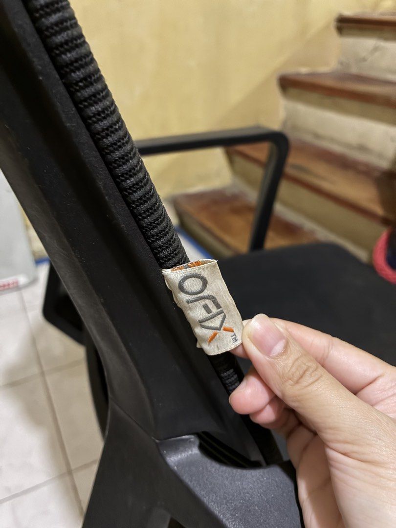 Ofix Black Ergonomic Office Chair with Mesh Back (Category: Office Furniture & Fixtures) located in Quezon City. Submitted by jade_declutters (Listing ID 1470051107, Image 2). Description: - last price - authentic ofix office ergonomic chair - breathable mesh backrest (presko sa likod) - heavy duty foam, gulong, and overall built (has some visible dark stains on the seat foam but washable) - up and down lift function not working for some reason g