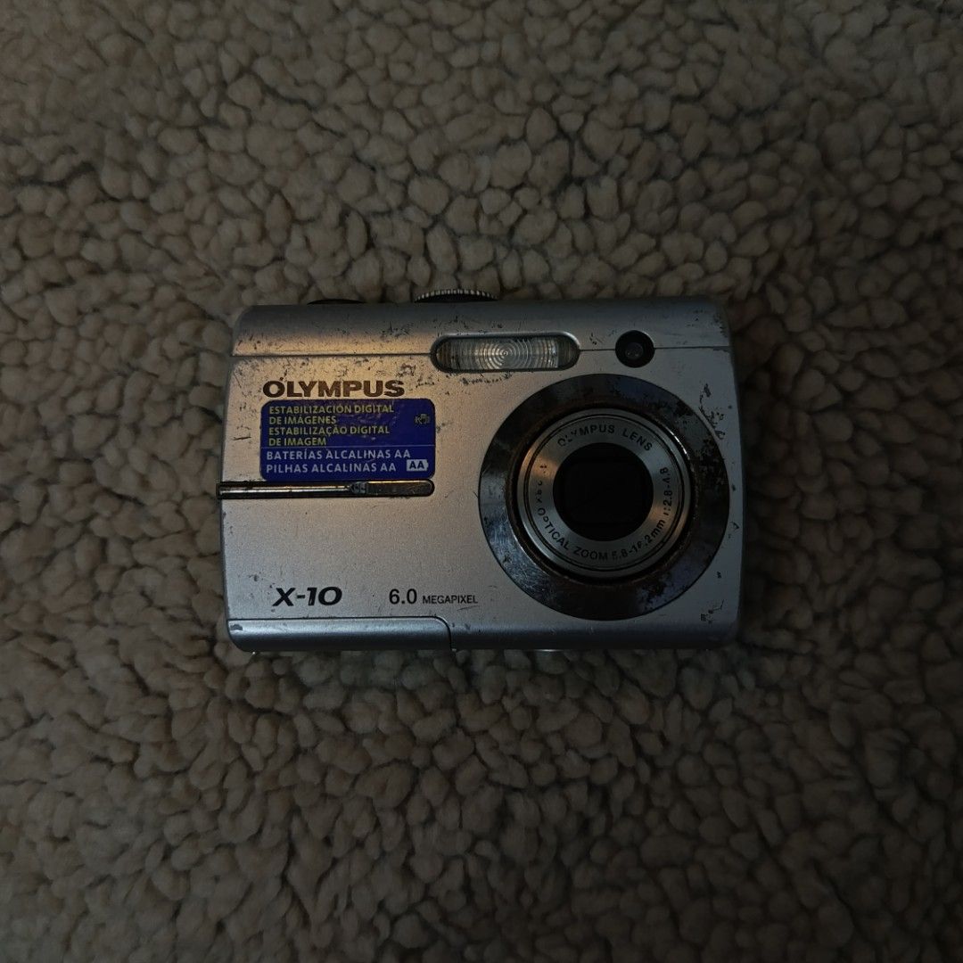 Olympus X-10 | untested camera 📸 (Category: Cameras) located in General Mariano Alvarez. Submitted by digicambylavy (Listing ID 1469950647, Image 1). Description: ۶ৎ Price: 400 PESOS ۶ৎ 6.0 megapixel | 3x optical zoom ۶ৎ no battery, no sampleshot, no charger 𝑪𝒐𝒏𝒅𝒊𝒕𝒊𝒐𝒏: 8/10 𝑰𝒔𝒔𝒖𝒆: cracked screen/minor scratches ✉️ DM TO REQUIRE 🤍 MOD: J&T 🤍 MOP: Gcash 📍 Cavite 𝑵𝒐𝒕𝒆: No return, no refunds, no exchanges, no warranty for ALL UN