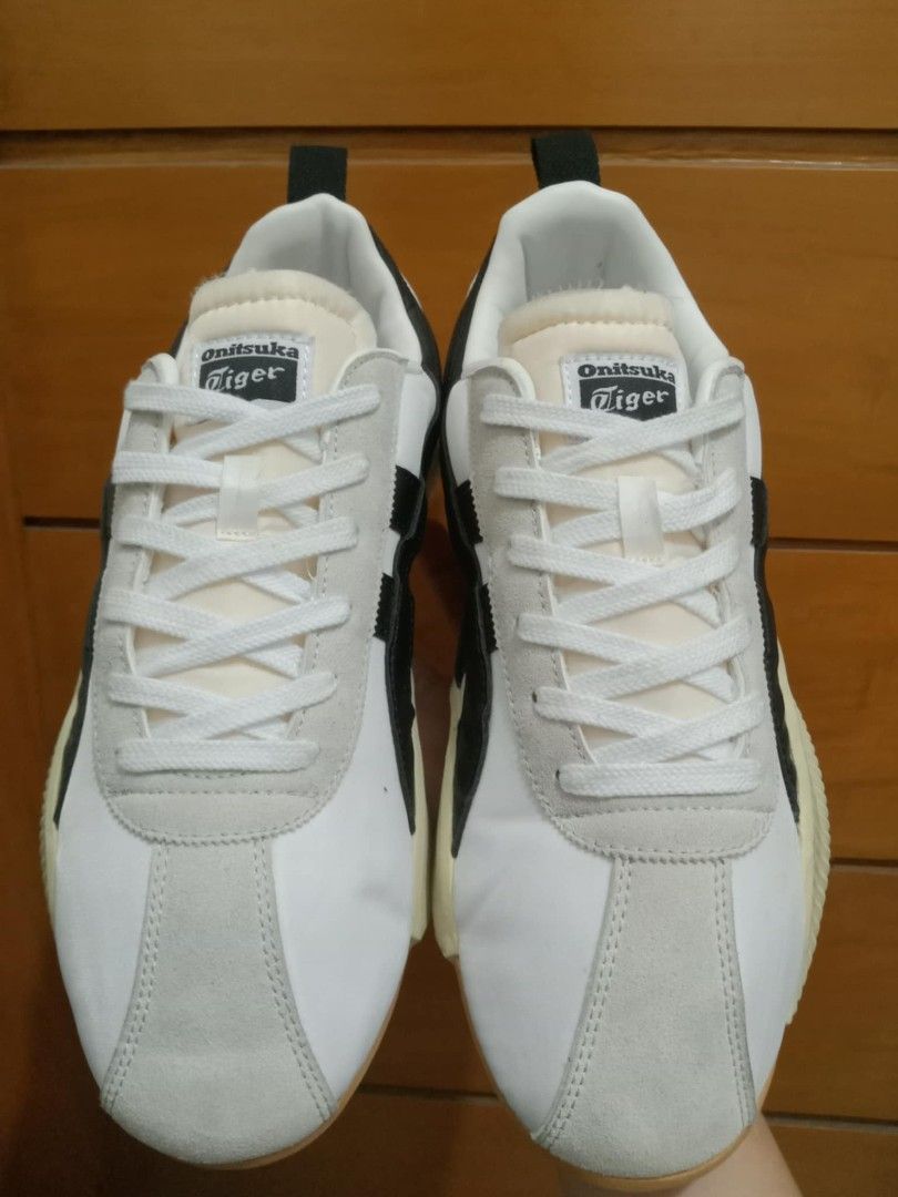 Onitsuka Tiger White Black Chunky Sneakers (Category: Sneakers & Footwear) located in Manila. Submitted by viernz_rose (Listing ID 1469963771, Image 1). Description: - Brand: Onitsuka Tiger - Colorway: White and Black - Sole: Distinct ridged chunky design - Upper: Premium suede and leather panels - Features: Heel pull tab for easy wearing, classic tongue tag, printed insole logo - Inclusions: Clean white laces - Condition: Brand new / Excellent q