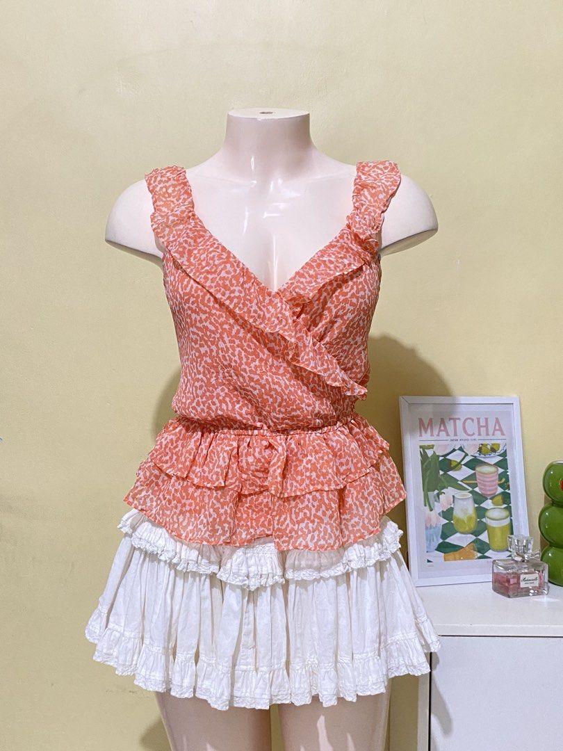 ORANGE PRINTED PEPLUM TOP (Category: Others Tops) located in Dasmarinas. Submitted by hannah.oakph (Listing ID 1469956049, Image 2). Description: medium to large.