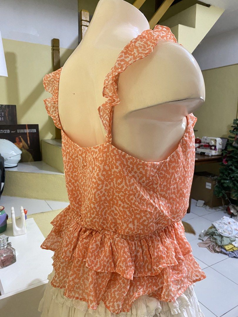 ORANGE PRINTED PEPLUM TOP (Category: Others Tops) located in Dasmarinas. Submitted by hannah.oakph (Listing ID 1469956049, Image 3). Description: medium to large.