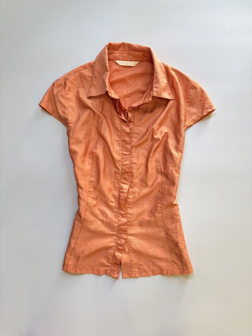 orange womens polo blouse (Category: Sleeveless) located in Tarlac. Submitted by pearl_xoxo (Listing ID 1470104198, Image 1). Description: - orange womens polo blouse bust: 17” waist: 15” length: 20” size: xs-sm issue: needwash brand: beissy .