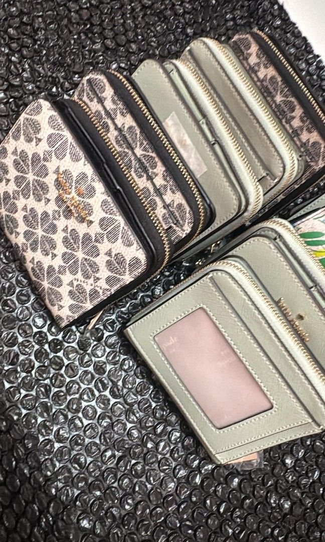 Original Kate Spade Wallets Coming (Category: Wallets & Card holders) located in Cavite. Submitted by chaellebrandsluxe (Listing ID 1469983027, Image 1). Description: No inclusions, selling low.