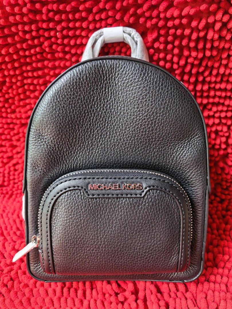 Original MK Jaycee Extra-Small Pebble Leather Convertible Backpack (Category: Backpacks) located in Puerto Galera. Submitted by charisarifinds (Listing ID 1470076154, Image 1). Description: Brand new Original Michael Kors Jaycee Extra-Small Pebbled Leather Convertible Backpack ✅ Backpack + Crossbody 7.5" L x 9" H x 4.25" W ✅ Fits long wallet Inclusion: Original packaging, tag, and care card 💯 Original from Canada, money back guaranteed if proven
