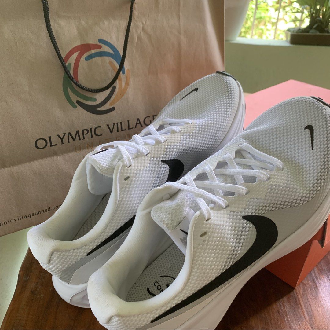 Original Nike Revolution 8 (Category: Sneakers) located in Camalig. Submitted by ryrilim (Listing ID 1468607960, Image 2). Description: Bought from Olympic Village Gateway Mall Cubao Used twice Ships via J&T Shipping will be shouldered by the buyer.