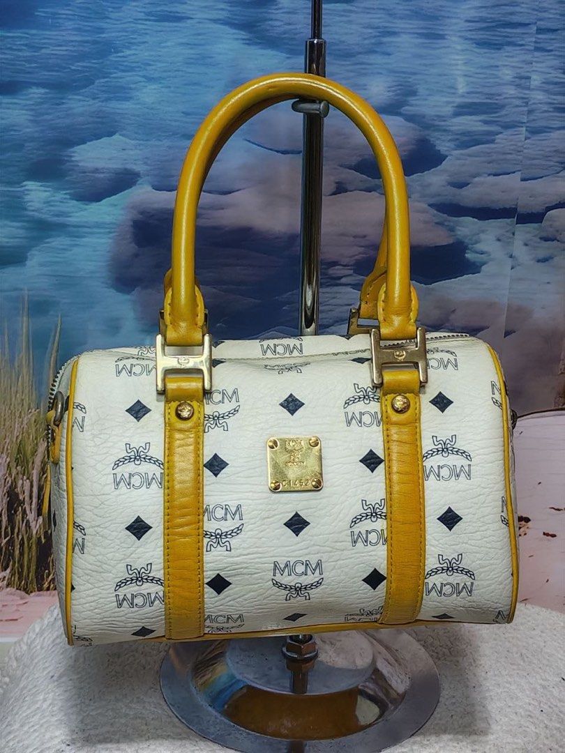 Original preloved MCM mini boston (Category: Luxury Bags & Wallets) located in Manila. Submitted by nylan1227 (Listing ID 1469957847, Image 2). Description: In good condition.