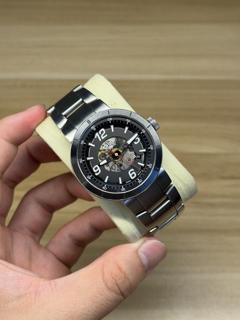 ORIS TT1 Skeleton Engine Date Automatic (Category: Luxury Watches) located in Manila. Submitted by mharkkk (Listing ID 1470127888, Image 1). Description: Oris TT1 Engine date Ref. 7668 (01 733 7668 4114) Movement: swiss automatic winding Case size: 43mm Inclusions: authentication paper & watch case Features skeleton dial & sapphire glass ₱44,500 📍Bulacan/QC Note: This is a pre-owned watch and may show signs of wear such as scratches, marks, or f