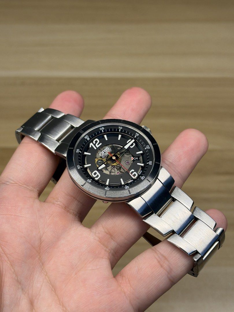ORIS TT1 Skeleton Engine Date Automatic (Category: Luxury Watches) located in Manila. Submitted by mharkkk (Listing ID 1470127888, Image 2). Description: Oris TT1 Engine date Ref. 7668 (01 733 7668 4114) Movement: swiss automatic winding Case size: 43mm Inclusions: authentication paper & watch case Features skeleton dial & sapphire glass ₱44,500 📍Bulacan/QC Note: This is a pre-owned watch and may show signs of wear such as scratches, marks, or f