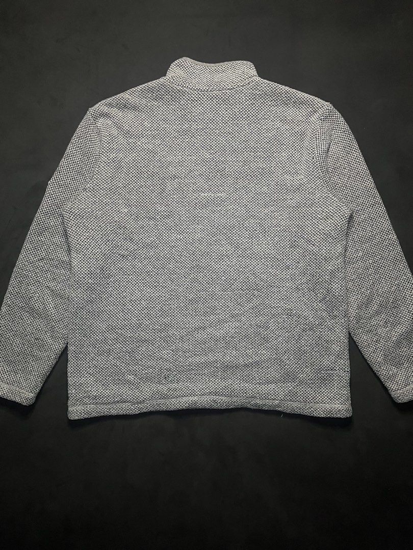 Orvis Classic Collection Grey Quarter-Zip Sherpa Lined Pullover (Category: Coats, Jackets and Outerwear) located in Muntinlupa City. Submitted by pastforwardthrift (Listing ID 1470124178, Image 2). Description: - Brand: Orvis Classic Collection - Style: Quarter-zip pullover in grey and white textured knit - Interior: Warm sherpa fleece lining on the body and inside the collar - Details: Branded zipper pull and subtle leather logo patch on the lef