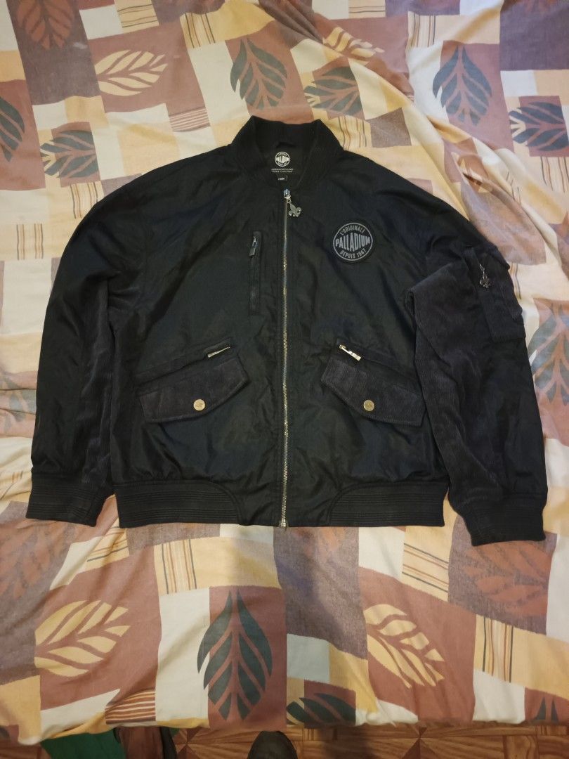 Palladium bomber jacket (Category: Activewear) located in Odiongan. Submitted by thriftngo26 (Listing ID 1470031947, Image 1). Description: This is a Palladium Logo MA-1 Bomber Jacket featuring a distinctive circular patch on the left chest that reads "L'Originale Palladium Depuis 1947"..