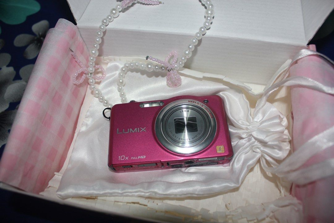 Panasonic Lumix DMC-SZ7 Pink Digital Camera (Category: Cameras) located in Ilagan. Submitted by damnshiela (Listing ID 1470137720, Image 3). Description: -Sample Photos Included at the end - Model: Panasonic Lumix DMC-SZ7 digital camera in a stylish pink finish - Lens: 10x Full HD zoom lens featuring premium Leica optics - Condition: Fully functional, powers on cleanly - Aesthetic: Perfect Y2K vintage digital camera vibe - Portability: Compact si