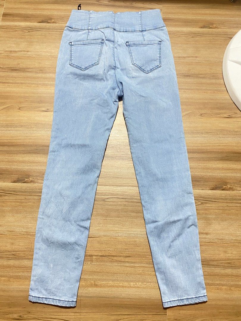 Pants 28"-32" length 38" (Category: Jeans) located in Bulacan. Submitted by Spothings (Listing ID 1470087064, Image 2). Description: - Style: Casual straight leg jeans - Fit: High waist with triple button closure - Wash: Light wash denim - Details: Features two back pockets - Versatility: Pairs easily with tees and crop tops - Note: Measurements available upon request.