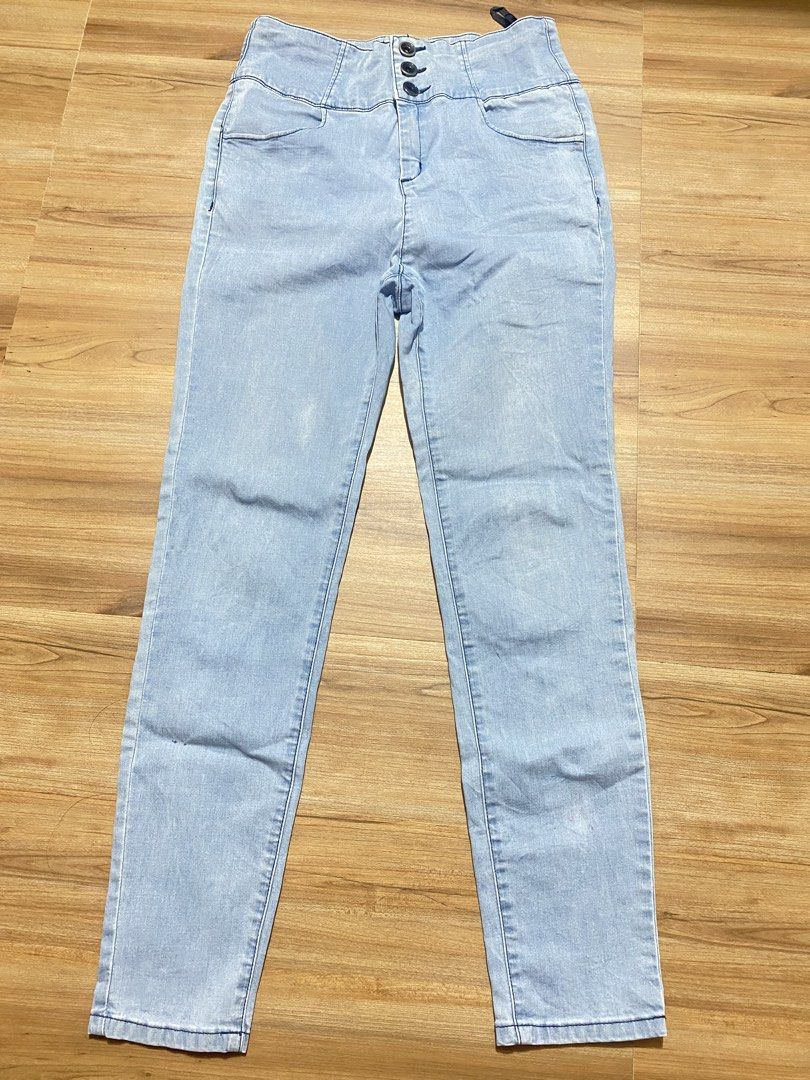 Pants 28"-32" length 38" (Category: Jeans) located in Bulacan. Submitted by Spothings (Listing ID 1470087064, Image 1). Description: - Style: Casual straight leg jeans - Fit: High waist with triple button closure - Wash: Light wash denim - Details: Features two back pockets - Versatility: Pairs easily with tees and crop tops - Note: Measurements available upon request.
