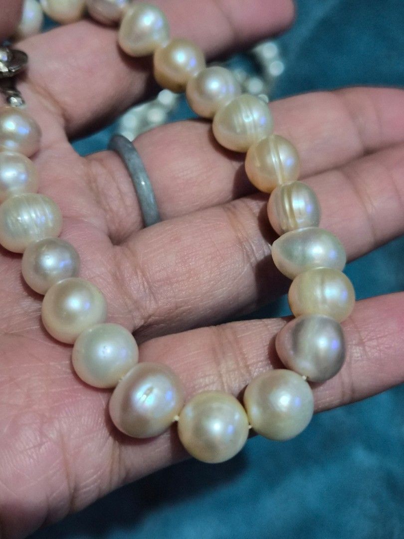 Pearl jewelry Set (Category: Necklaces) located in Mandaue City. Submitted by chuchi152615 (Listing ID 1469971506, Image 3). Description: - Stunning pearl jewelry set in classic white and pinkish tones - Includes 2 elegant beaded bracelets with secure clasps - Features 1 stretch bracelet accented with sparkling rhinestone spacers - Comes with a matching ring centered with a single pearl - Versatile accessories perfect for daily styling or as a th
