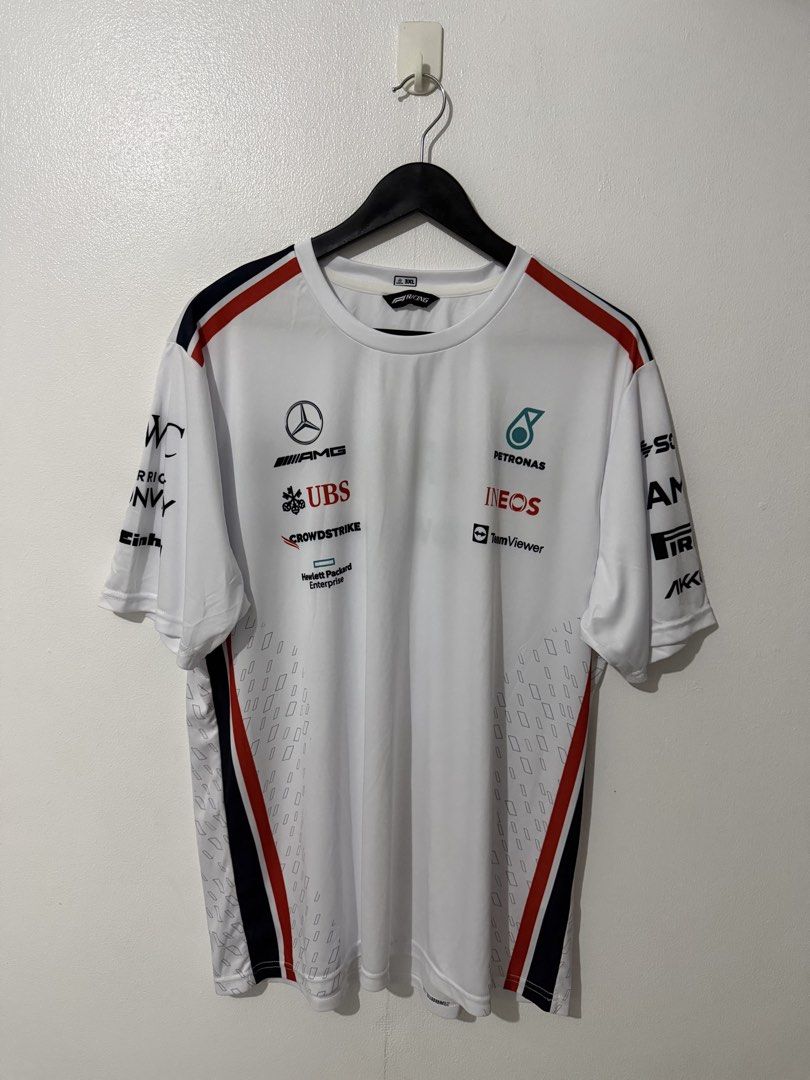 Petronas x Crowdstrike F1 Racing Tee - White (Category: Tshirts & Polo Shirts ) located in Caloocan City. Submitted by thriftingbanana (Listing ID 1470073887, Image 1). Description: Excellent No issue 3XL on tag Width 24 inches Length 28 inches.