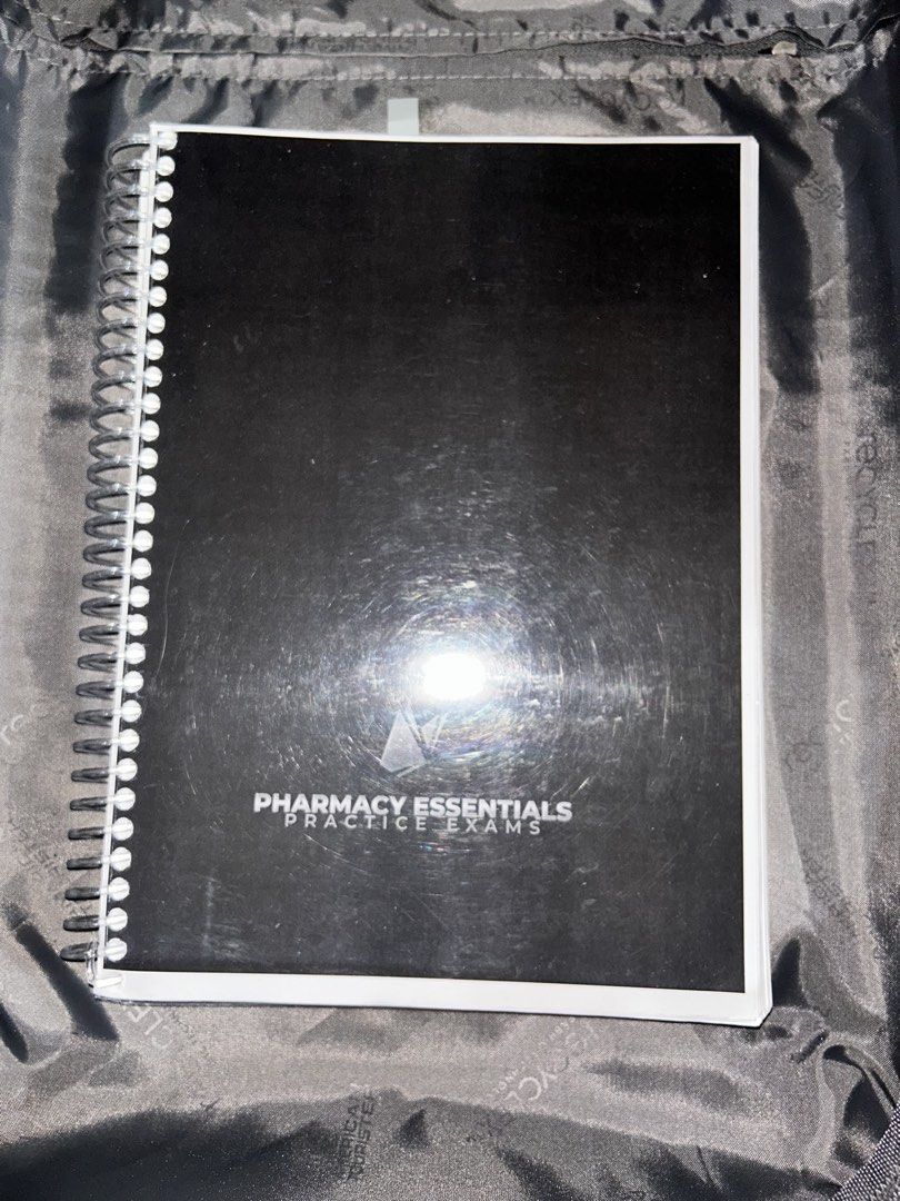Pharmacy Essentials Practice Exams (Category: Textbooks) located in Manila. Submitted by supreem (Listing ID 1470009588, Image 1). Description: - Item: Pharmacy Essentials Practice Exams (Spiral-bound review book) - Condition: Plastic protective cover has light surface scratches from storage - Ideal for pharmacy board exam or course review preparation.