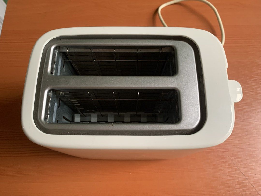 Philips Bread Toaster (Category: Ovens & Toasters) located in Antipolo. Submitted by rex.dn (Listing ID 1470118213, Image 2). Description: Philips 2-Slice Bread Toaster RFS: Decluttering ✔ Philips original ✔ Fully tested and working perfectly ✔ Heats quickly ✔ Browning control with multiple settings ✔ Cancel button ✔ Clean and well-maintained ✔ No issues.