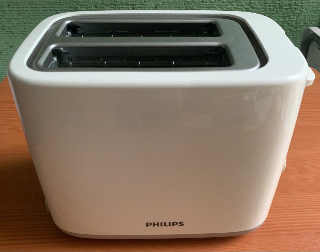 Philips Bread Toaster (Category: Ovens & Toasters) located in Antipolo. Submitted by rex.dn (Listing ID 1470118213, Image 1). Description: Philips 2-Slice Bread Toaster RFS: Decluttering ✔ Philips original ✔ Fully tested and working perfectly ✔ Heats quickly ✔ Browning control with multiple settings ✔ Cancel button ✔ Clean and well-maintained ✔ No issues.
