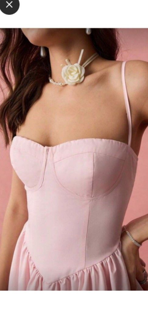Pink Spaghetti Strap Corset Midi Dress (Category: Dresses) located in Manila. Submitted by shop.airens (Listing ID 1469995147, Image 2). Description: - Color: Light pink - Style: Midi dress with sweetheart bustier top and thin adjustable spaghetti straps - Skirt: Flared midi-length with built-in tulle layers for extra volume - Sizing: Please refer to the size chart image for exact bust, waist, and length measurements.