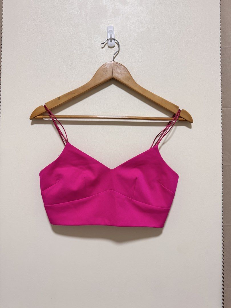 Pink Spaghetti Strap Crop Top (Category: Sleeveless) located in Manila. Submitted by seayouncey (Listing ID 1470069811, Image 1). Description: - Brand: River Island - Color: Vibrant fuchsia / bright pink - Design: Double spaghetti straps, sweetheart neckline, structured cups - Closure: Back button closure with three metallic buttons - Interior: Fully lined - Occasion: Ideal for parties, clubbing, and nights out.