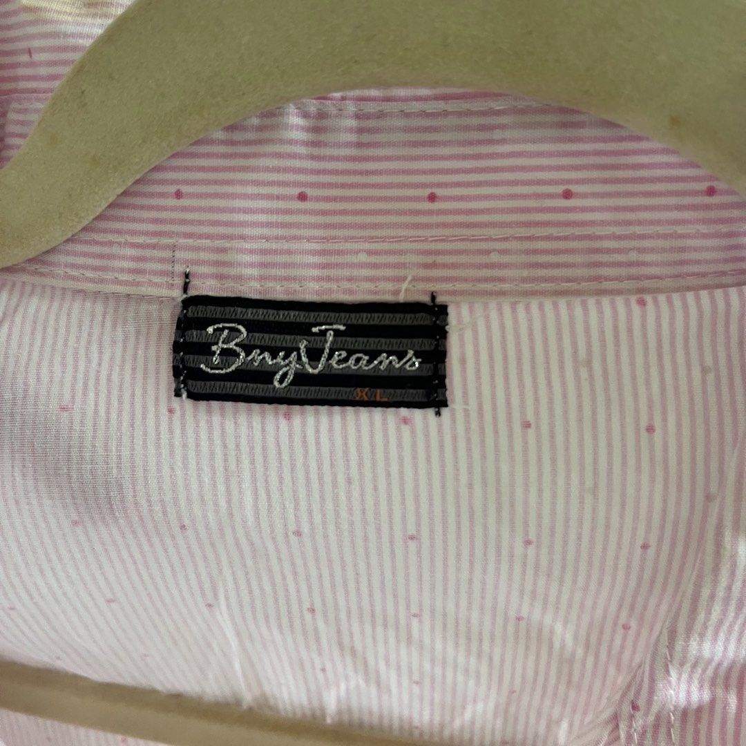 Pink Striped Button-Up Shirt (Category: Shirts) located in Legazpi City. Submitted by hushedcry (Listing ID 1470105171, Image 3). Description: - Brand: Bny Jeans — needs wash (has stain sa may collar, see pic) — XL on tag 💌 mop: gcash/bank transfer 📬 shipping via j&t express (sf c/o buyer) for inquiries, dont hesitate to send me a msg! 🩷.